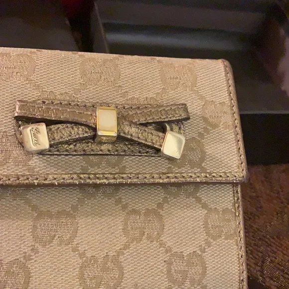 Authentic Gucci GG trifold bow wallet - Picture 4 of 14